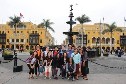 May participants stop for a photo in Historic Downtown Lima